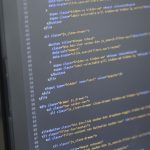 Code on computer screen programming software